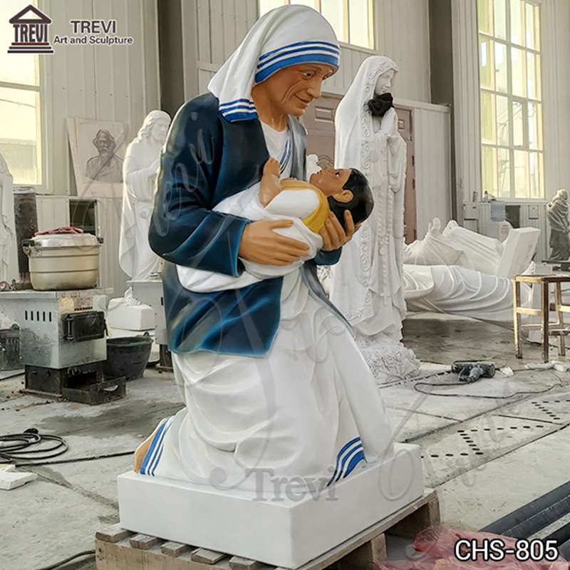 mother Teresa holding a baby-Trevi Sculpture